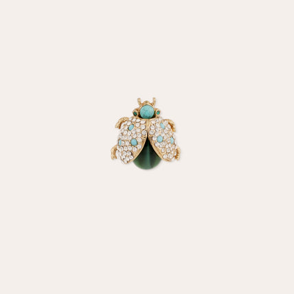 Broche de mariquita con pedrería